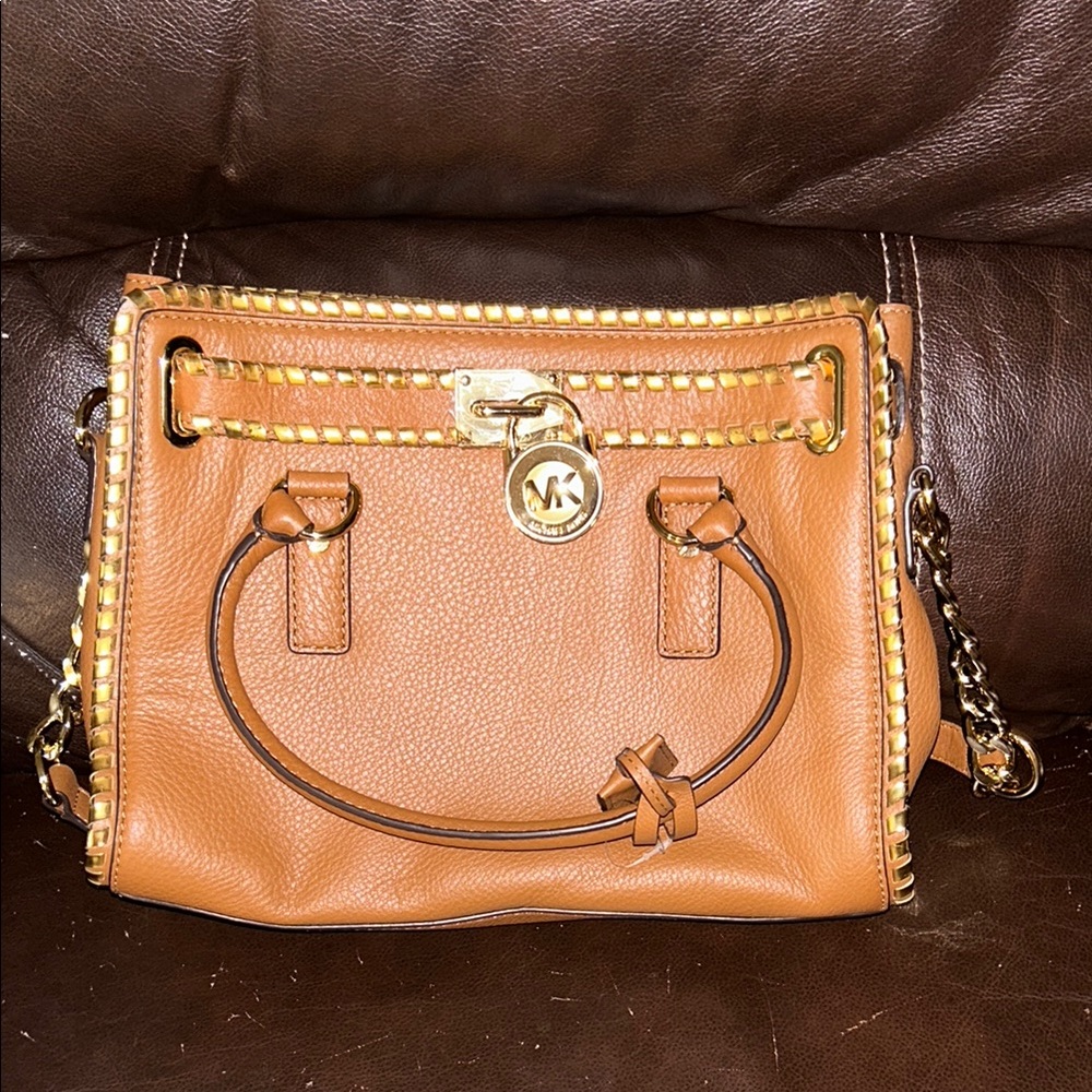 Michael Kors Tan whipped Hamilton